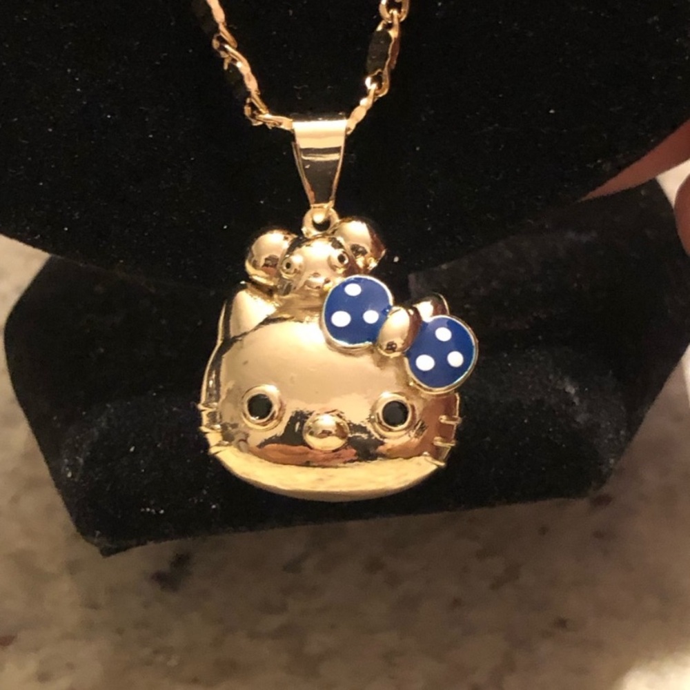 Hello Kitty Gold Pendant Necklace with Blue Accents